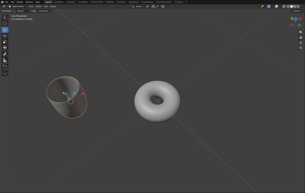 Ging's first Blender donut, a smooth grey torus in the viewport beside a hollow cylinder.