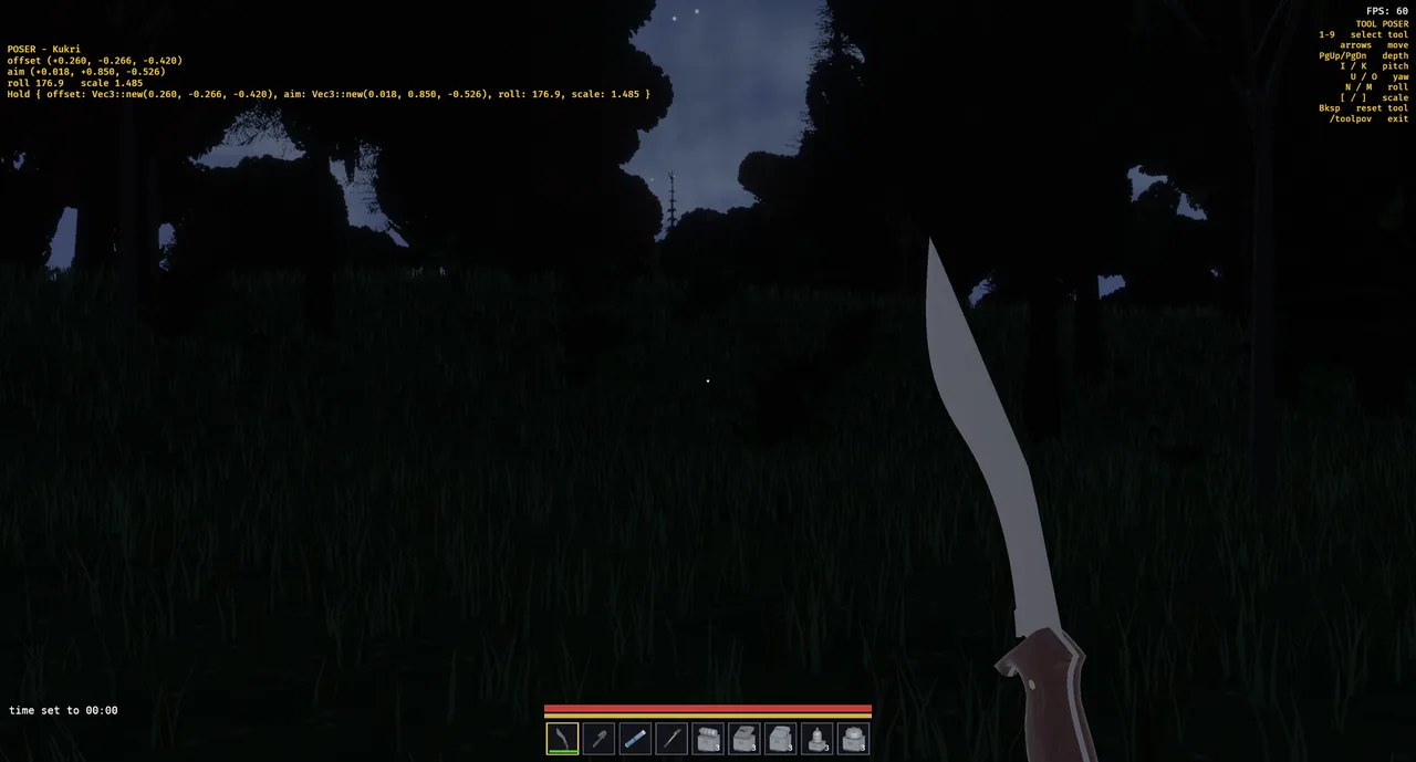 The kukri held up in the tool poser at night, the blade catching the moonlight.