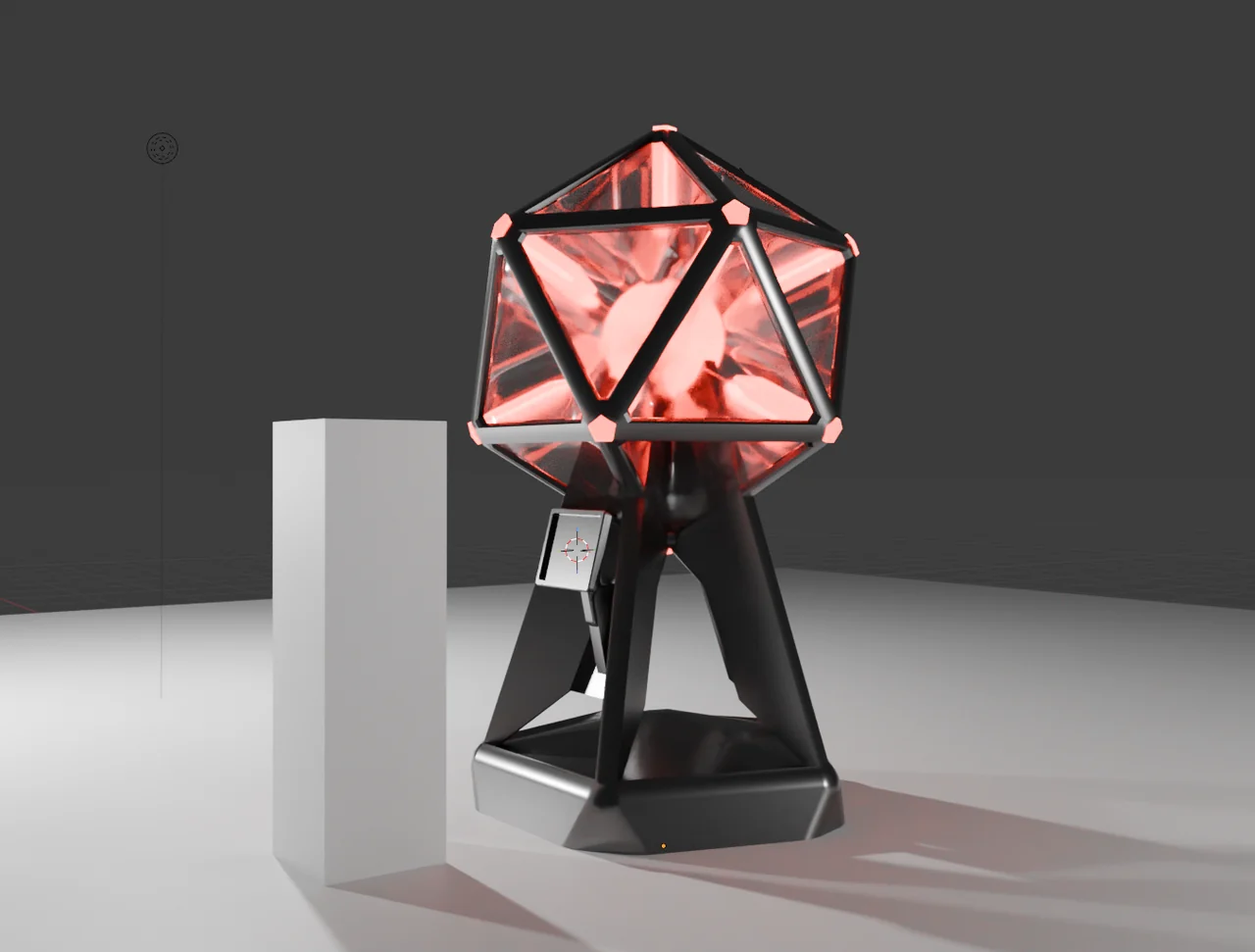 The Shell Emitter in the modeling kit, its caged core glowing red.